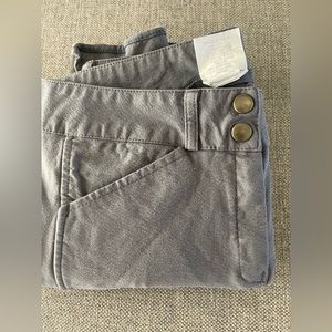 Bundle of grey and tan breeches